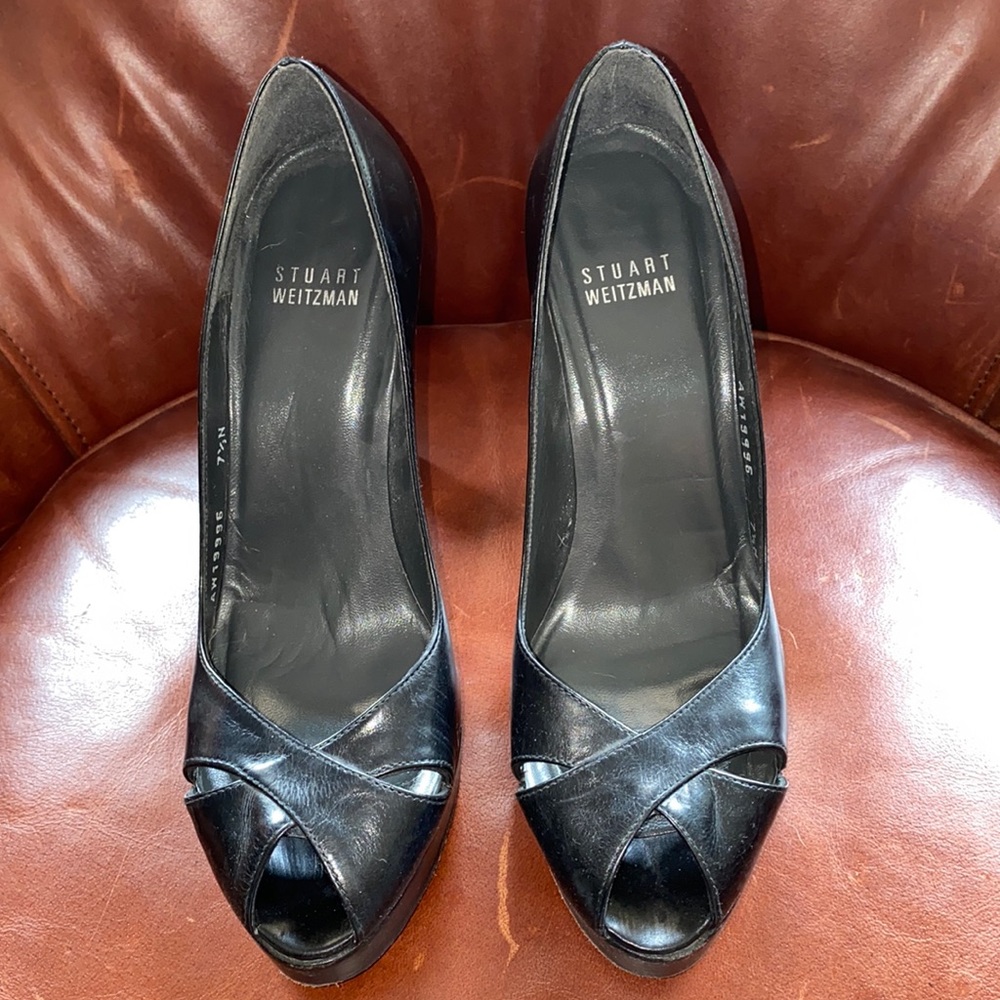 ** lowest price before donated*Stuart Weitzman size 7 1/2 N black platform heels